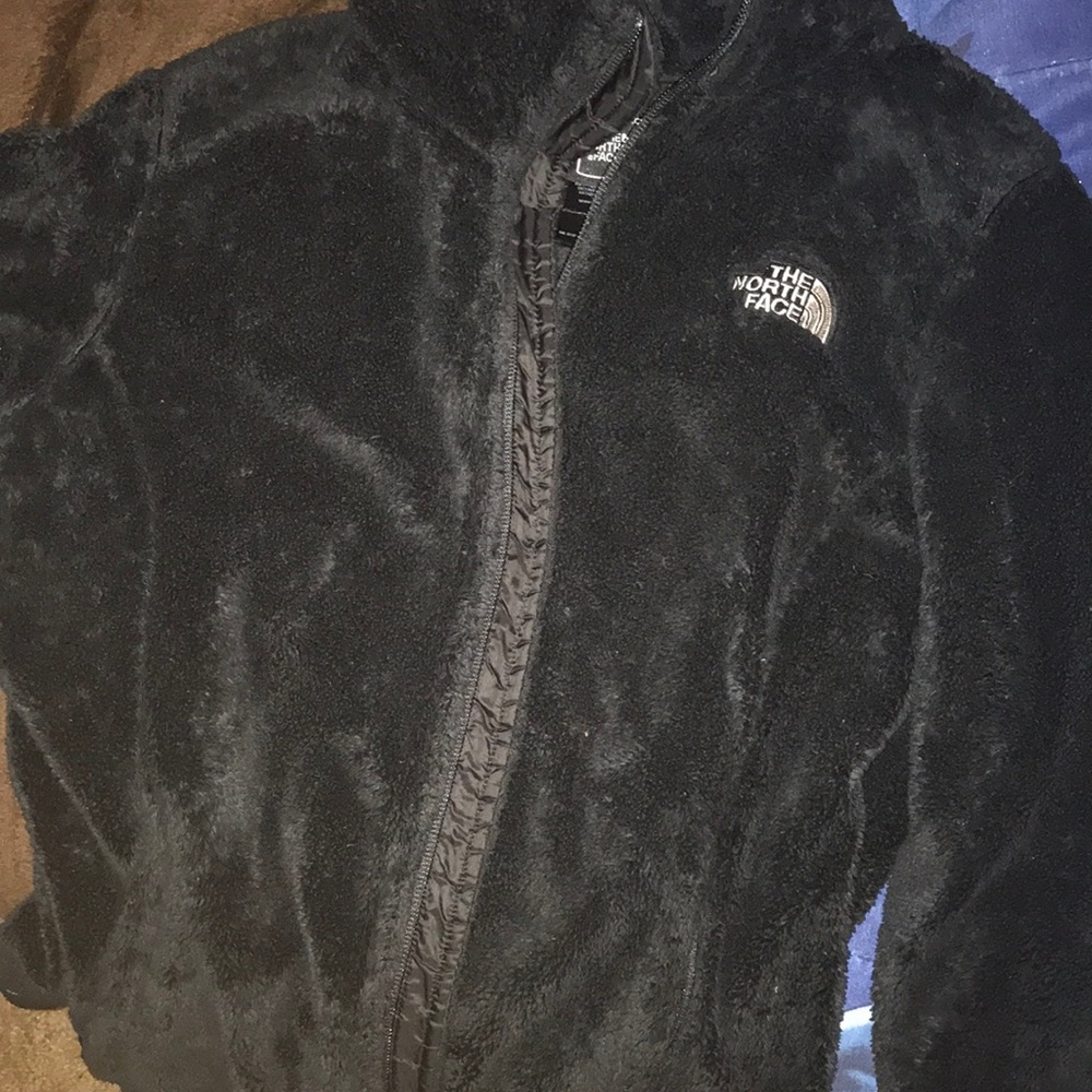 black north face jacket .